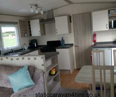 3 bed caravan with decking on Elms area of Devon Cliffs