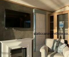 2 bed diamond mini lodge with decking on cedars Stunning Seaviews Pet Friendly