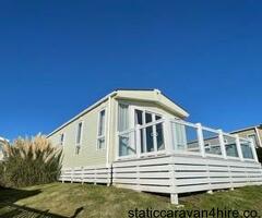 2 bed diamond mini lodge with decking on cedars Stunning Seaviews Pet Friendly